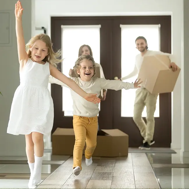 Happy family moving into new home